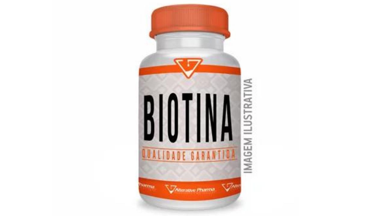 Biotina branca e laranja em fundo branco