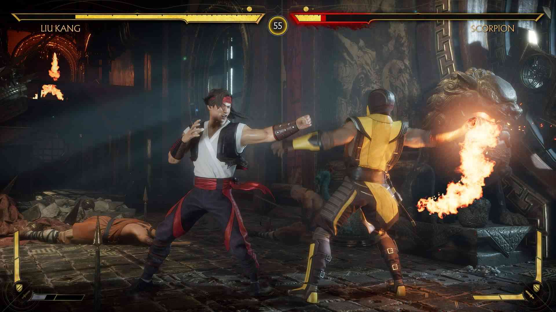 Captura de tela do jogo Mortal Kombat 11 mostrando uma luta entre Liu Kang e Scorpion