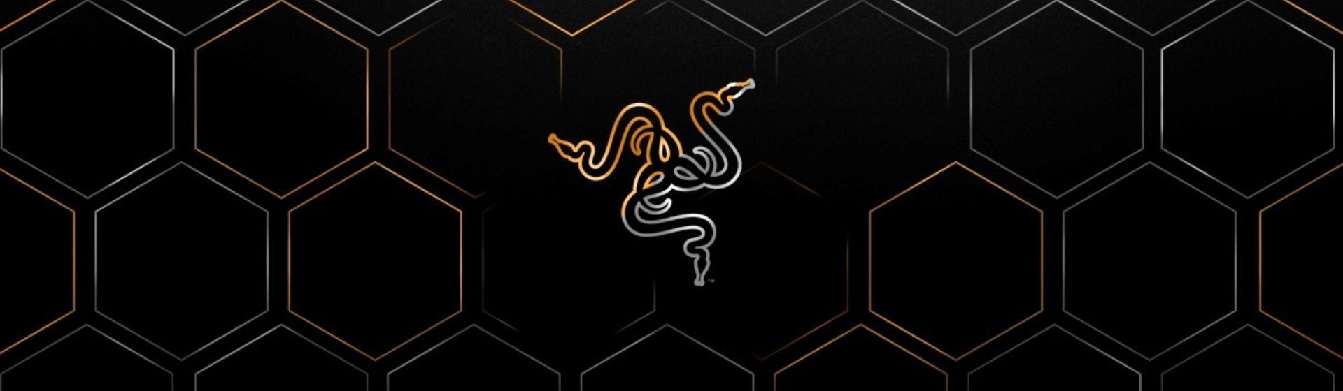 Logo da Razer dourado no fundo preto com hexágonos