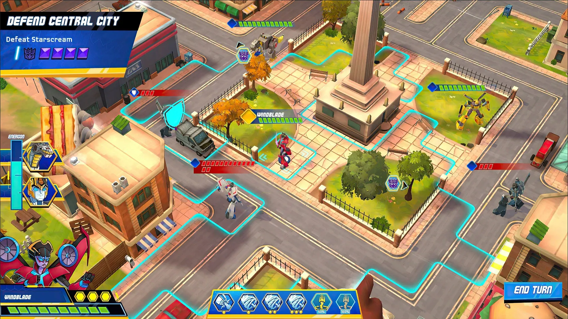 Imagem do jogo Transformers Battlegrounds que mostra uma cidade em uma visão área inclinada com algumas unidades Autobots e Decepticons espalhadas pelo campo de batalha