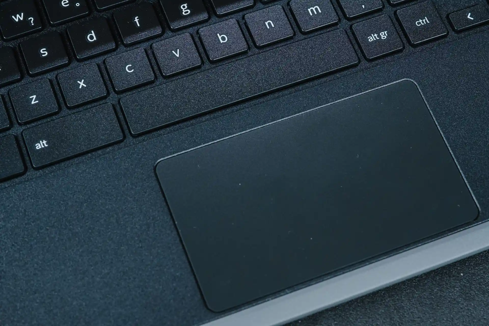 Foto do Acer Chromebook com zoom na área de trackpad