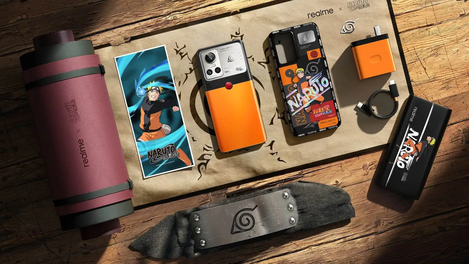 Imagem do celular temático da Realme junto a todos os seus acessórios