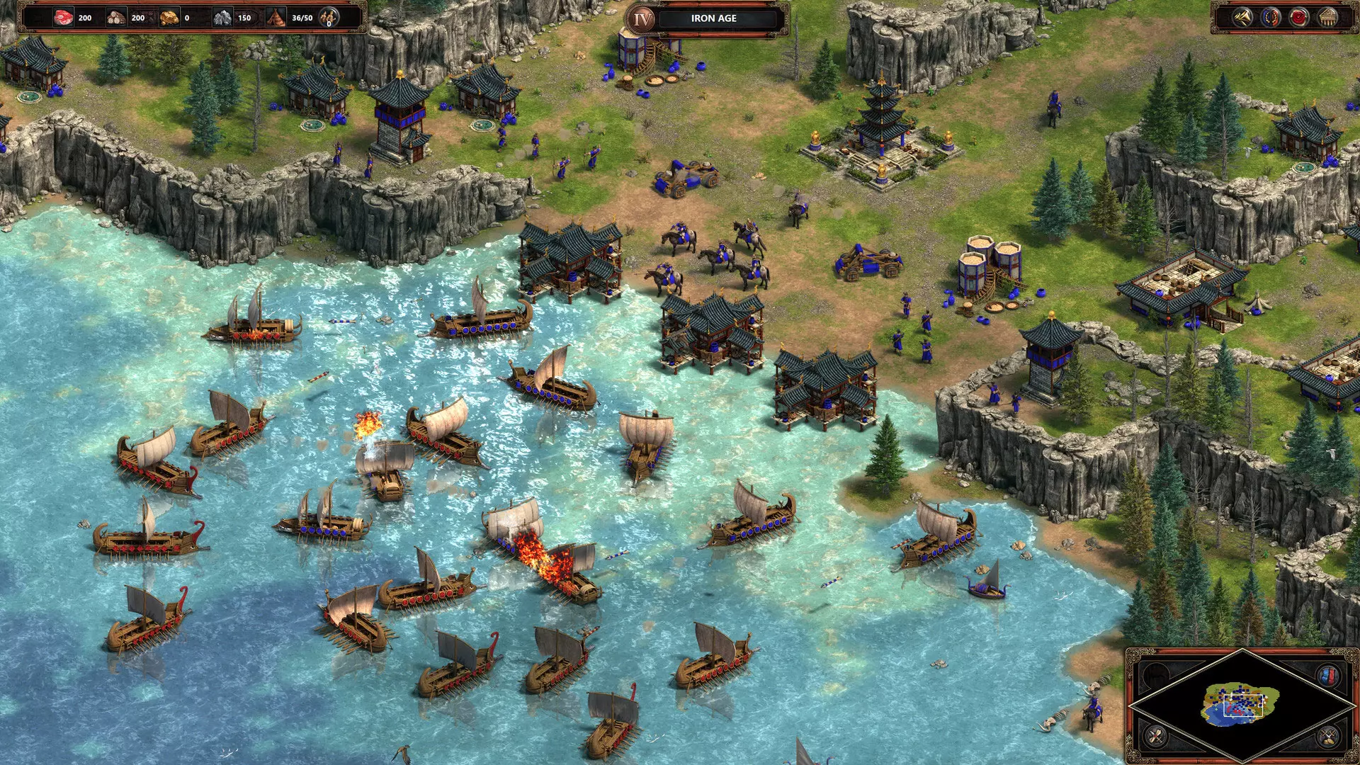 Imagem do jogo Age of Empires Definitive Edition, na qual barcos do exército vermelho atacam barcos do exército azul que possui uma cidade costeira próxima