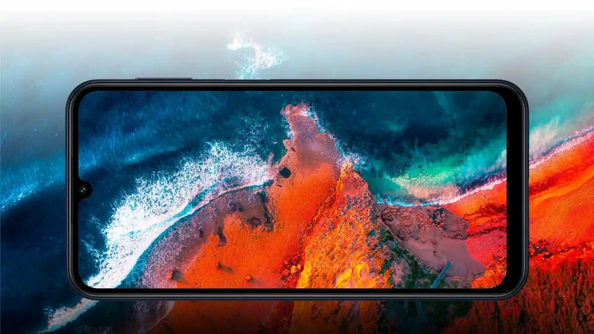 Um celular está na horizontal com a tela ligada. Na tela aparece uma pintura que transborda para fora do aparelho