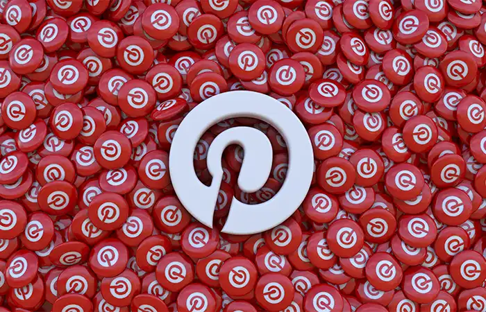 Grande ícone branco do Pinterest a frente de inúmeros ícones vermelhos