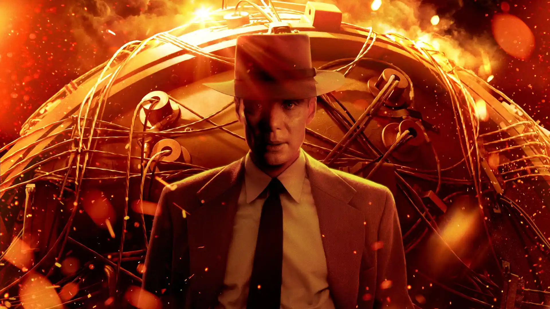 O ator Cillian Murphy com uma bomba atômica atrás dele em um fundo laranja