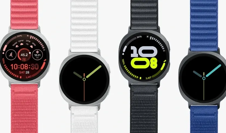 Quatro relógios com pulseiras coloridas estão lado a lado 