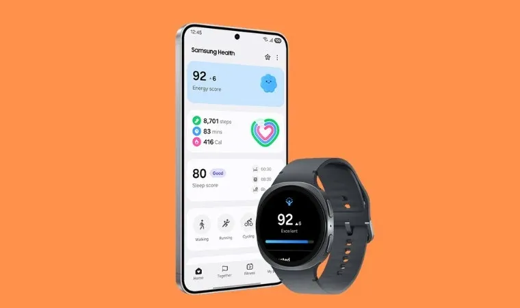 Um celular está na vertical, ao lado de um relógio inteligente da Samsung