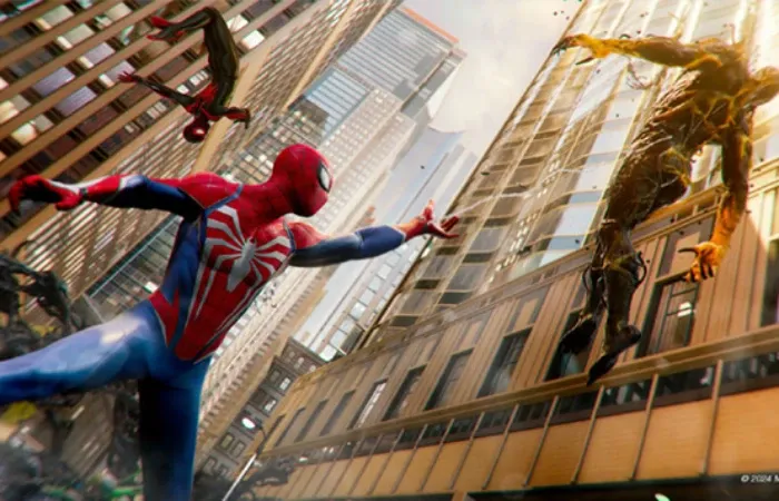 Imagem do jogo Marvel’s Spider-Man 2 com os heróis Homem-Aranha de Peter Parker e Miles Morales enfrentando um inimigo tomado pelo simbionte de Venom