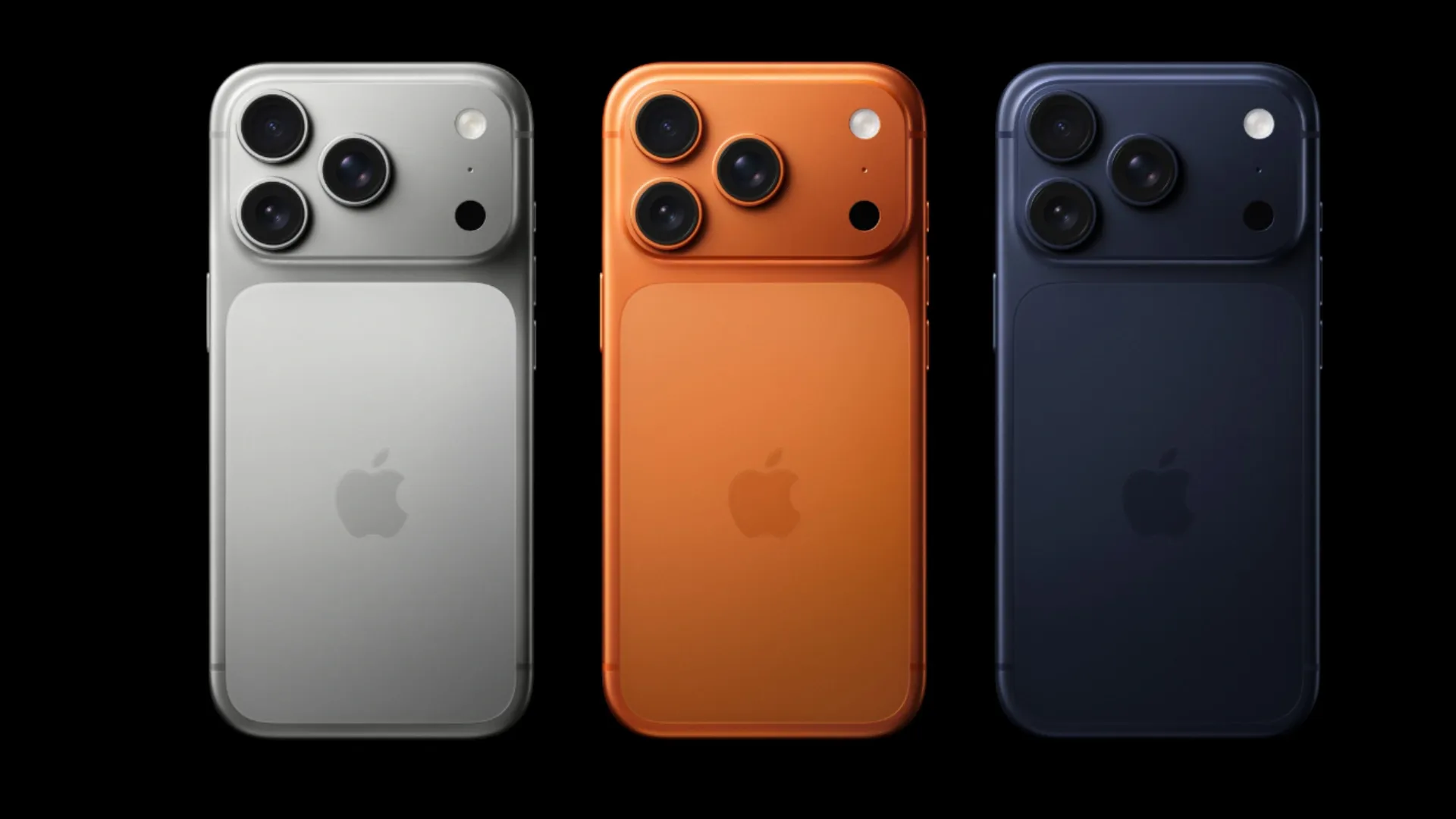  iPhone 17 Pro Max exibido em três cores diferentes — prata, laranja e azul em fundo preto