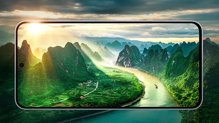 Imagem do Galaxy S25 FE exibindo uma paisagem de rio entre montanhas na tela