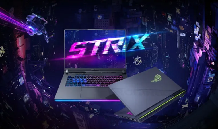 Notebook gamer ASUS ROG Strix G16 aberto com um segundo modelo semiaberto abaixo em um fundo futurista