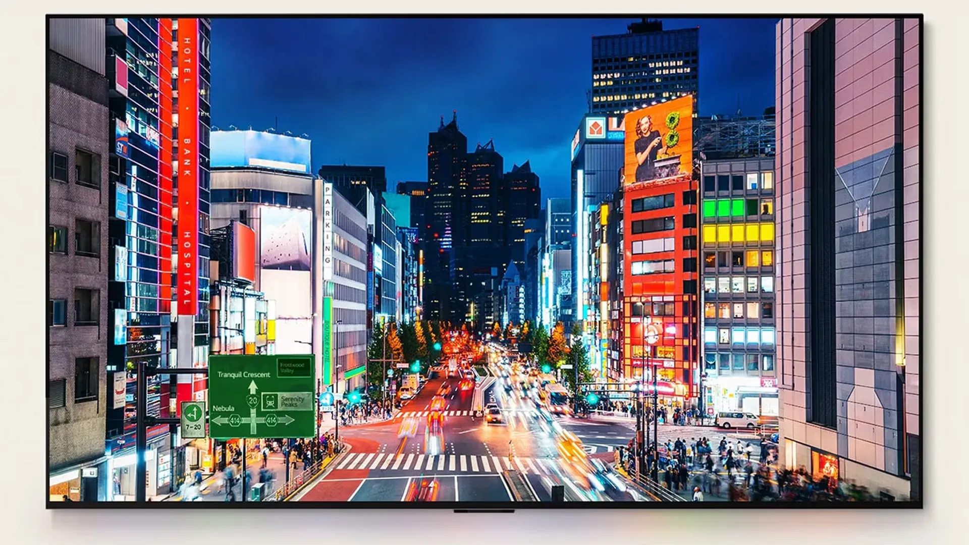 Imagem da LG OLED C4 mostrando imagem noturna de cidade com alto brilho e cores vivas.