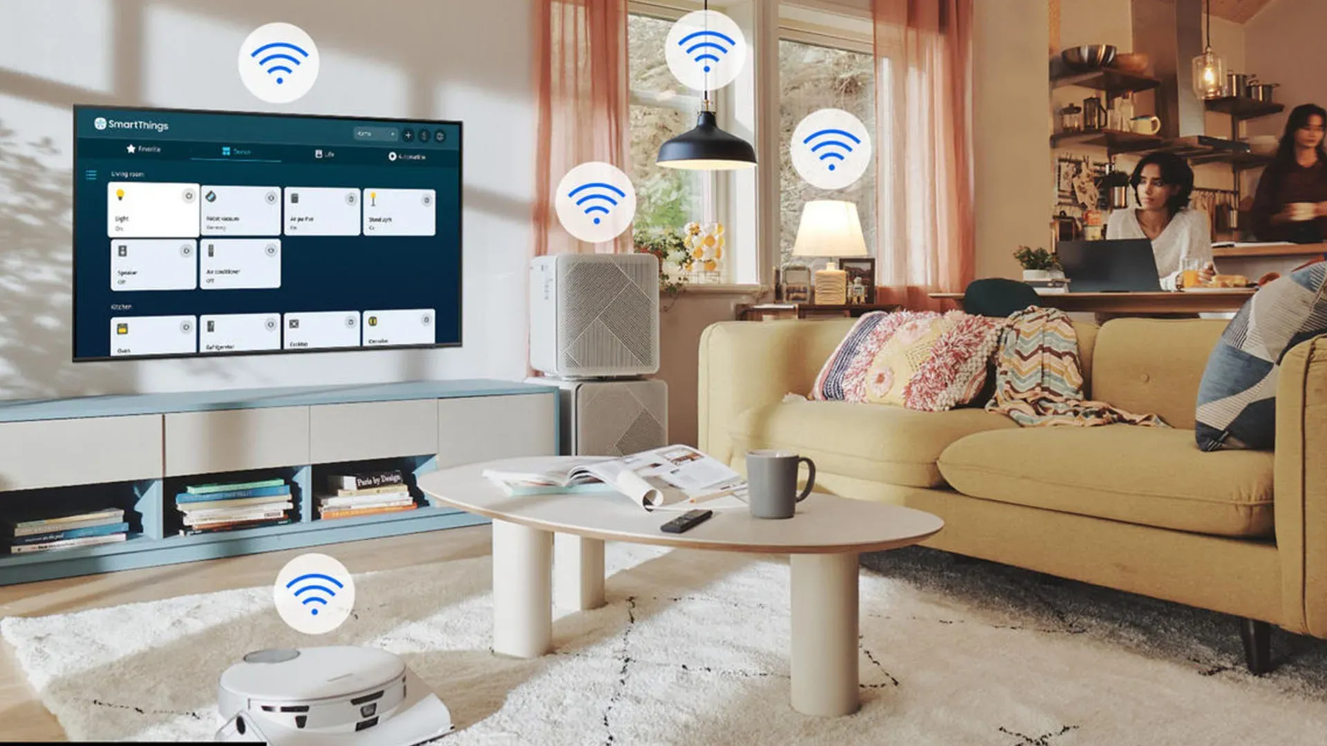 Imagem da sala com TV Samsung OLED S90C exibindo painel SmartThings, conectada a lâmpadas, robô aspirador e dispositivos IoT por Wi-Fi