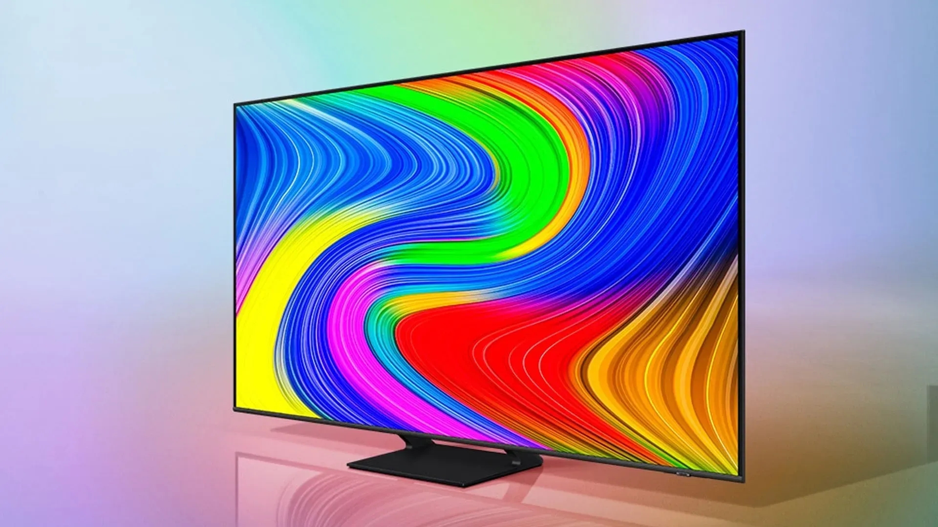 Imagem da Smart TV Samsung Q65D 55” exibindo imagem vibrante com gradientes de cor, ilustrando a tecnologia QLED