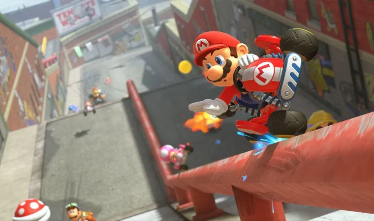 Imagem do jogo Mario Kart World mostrando Mario equilibrando seu kart em duas rodas em cima de um corrimão utilizando a nova técnica de Grind do game 