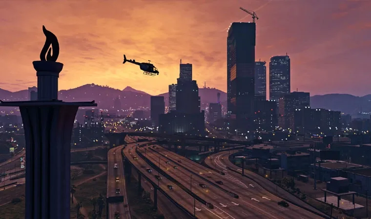 Imagem do jogo GTA 5 mostrando a cidade de Los Santos com prédios ao fundo, autoestradas e um helicóptero voando 