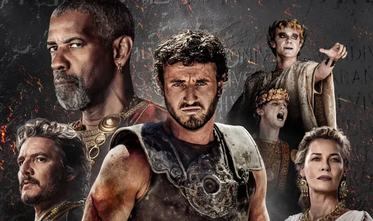 Imagem promocional de Gladiador II, com os personagens principais vestidos com trajes romanos diante de um fundo cinza e dourado. 