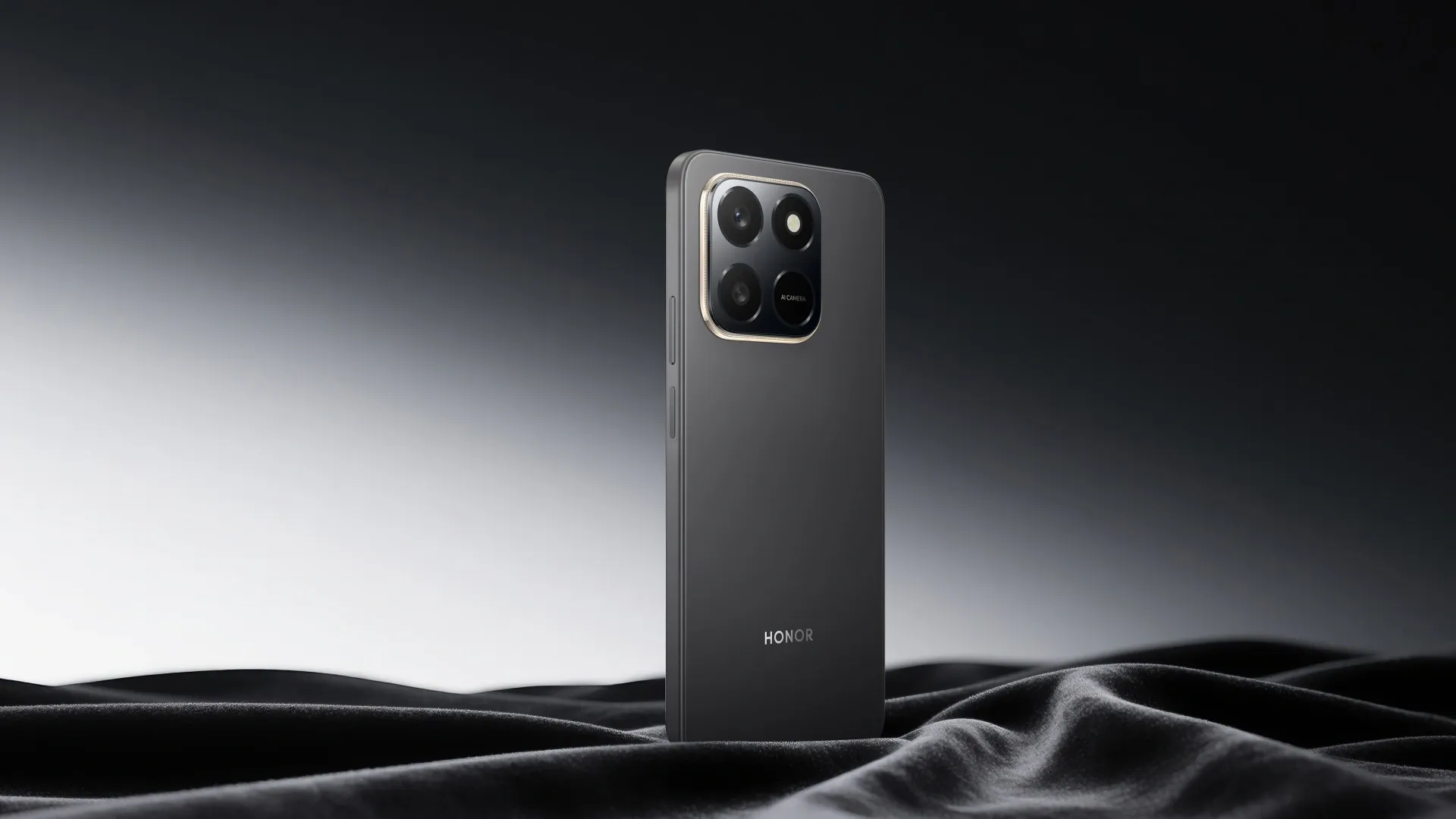 Traseira do HONOR X7d em fundo preto e cinza