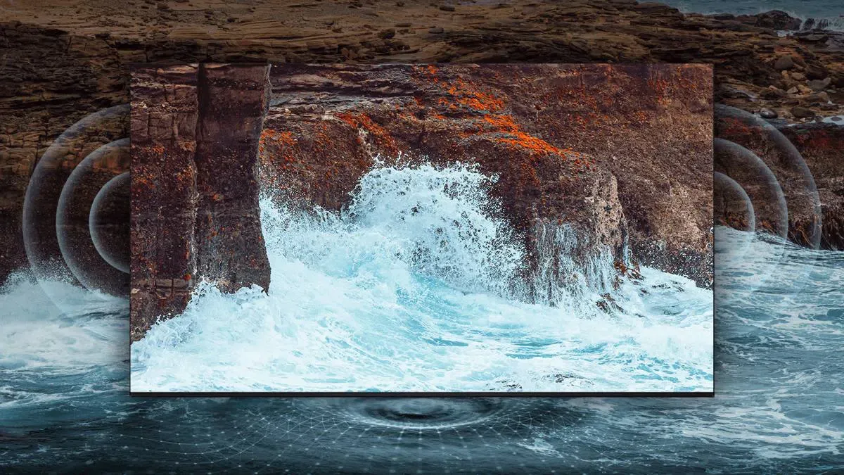 TV TCL C655 em uma parede mostrando design ultrafino.