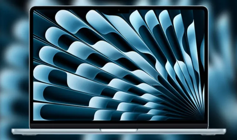 MacBook Air M4 aberto em direção à câmera com uma imagem em formato de leque com lâminas azuladas em vários tons