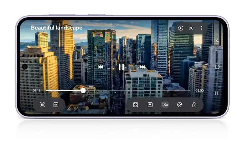 Samsung Galaxy A37 5G na horizontal exibindo um vídeo de paisagem urbana com prédios, demonstrando a qualidade da tela