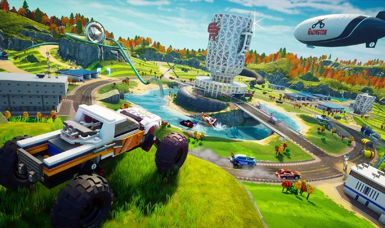 Imagem do jogo LEGO 2K Drive com uma caminhonete de blocos de montar LEGO no topo de uma montanha
