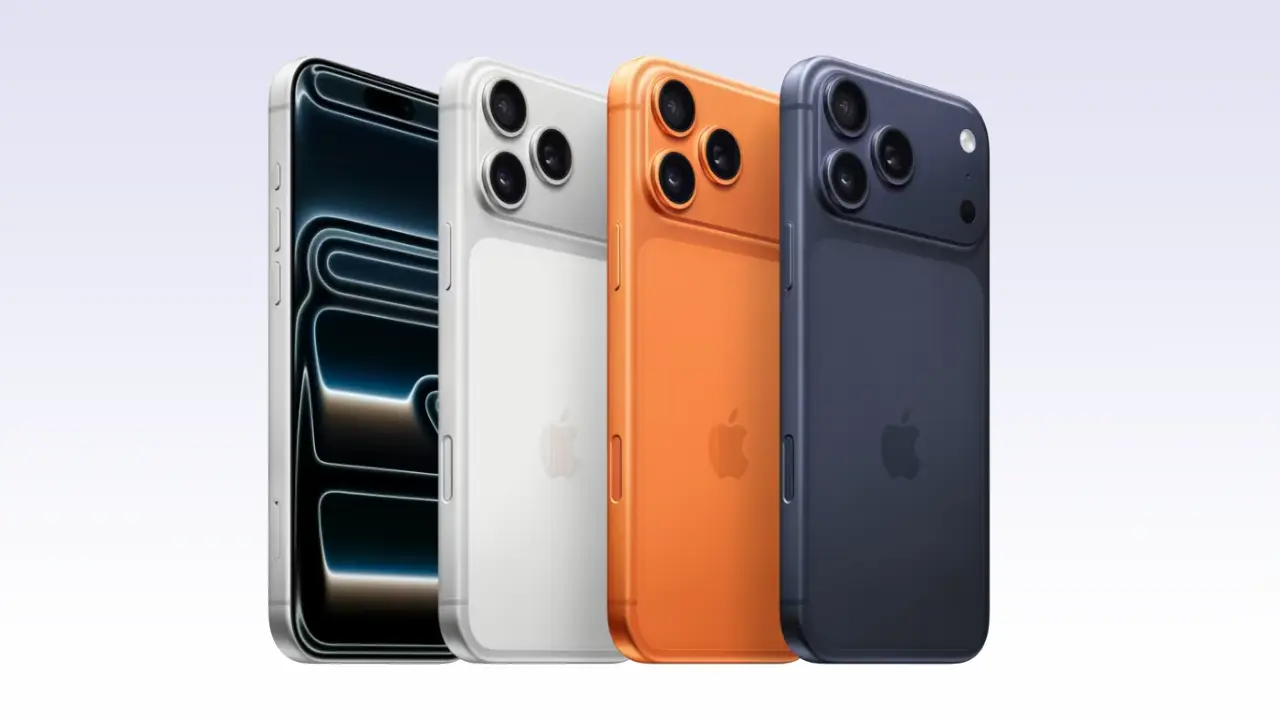 Quatro iPhones 17 Pro Max nas cores prata, branca, laranja e azul, com três câmeras traseiras.